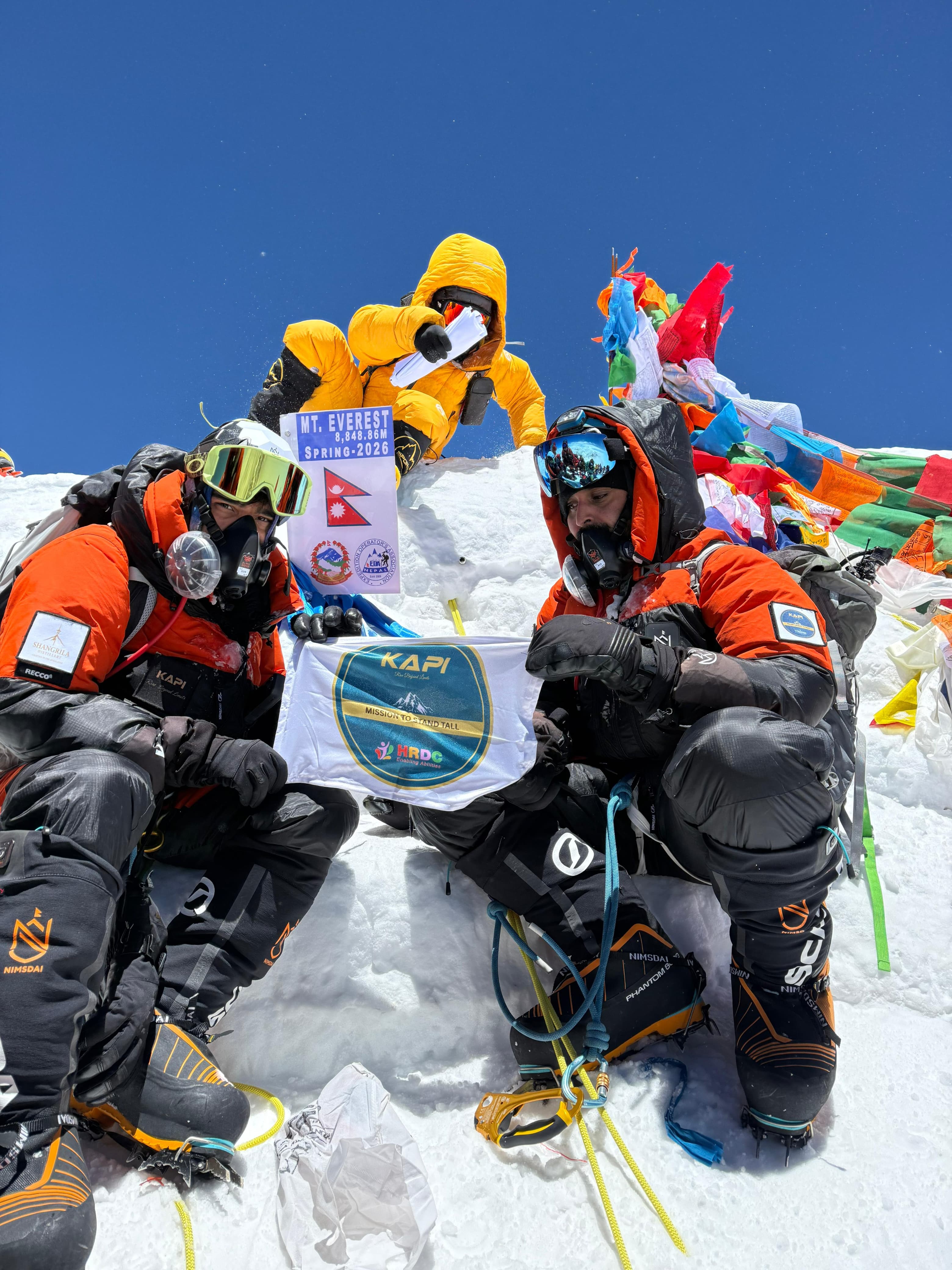 Mission to Stand Tall banner shown on Mount Everest